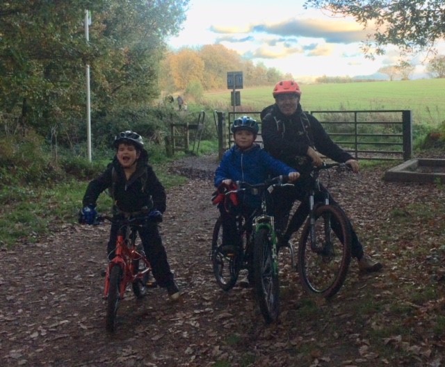 Sean Craven with his two children, all on bicycles