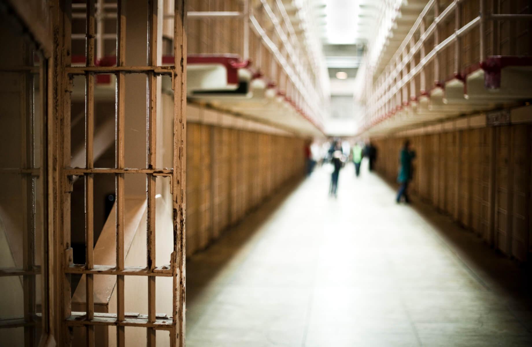 A corridor in a prison on the ground floor, similar to where our client suffered a workplace assault.