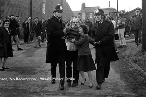 police officers with distraught citizens