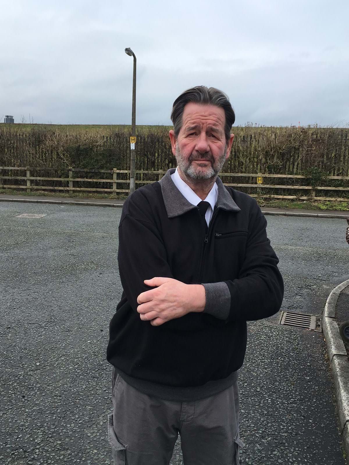 Bob Tucker standing outside