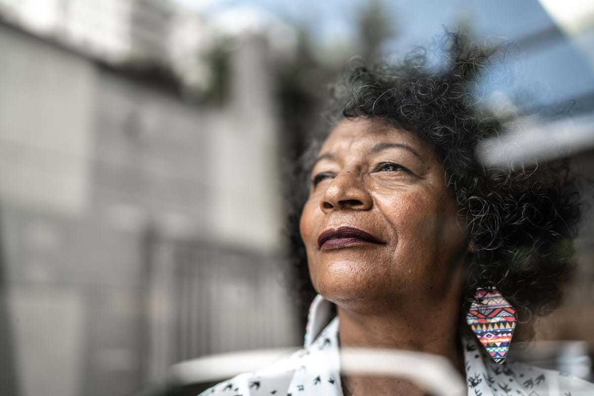 A woman looking out of a window