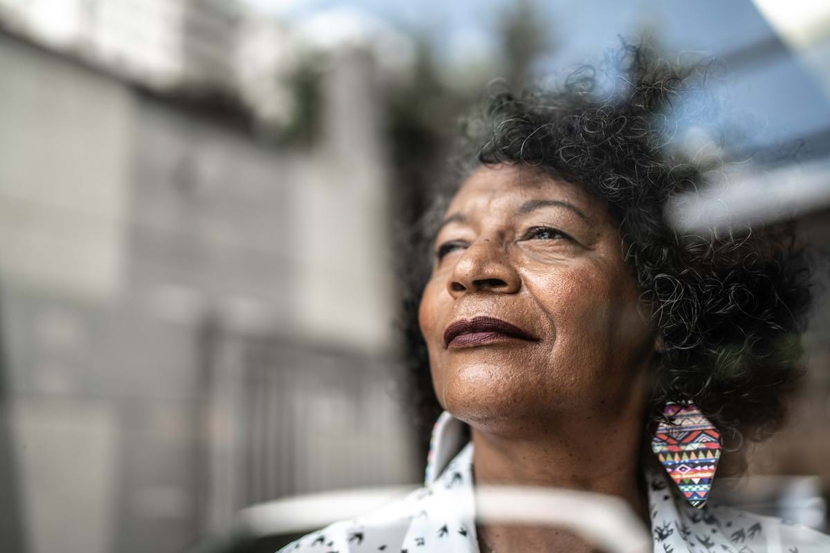 A woman looking out of a window