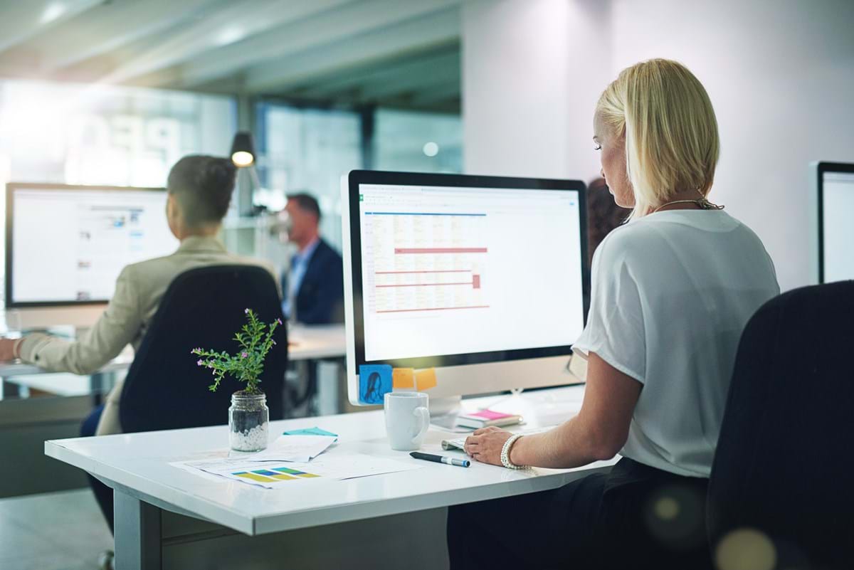 A woman working at a computer