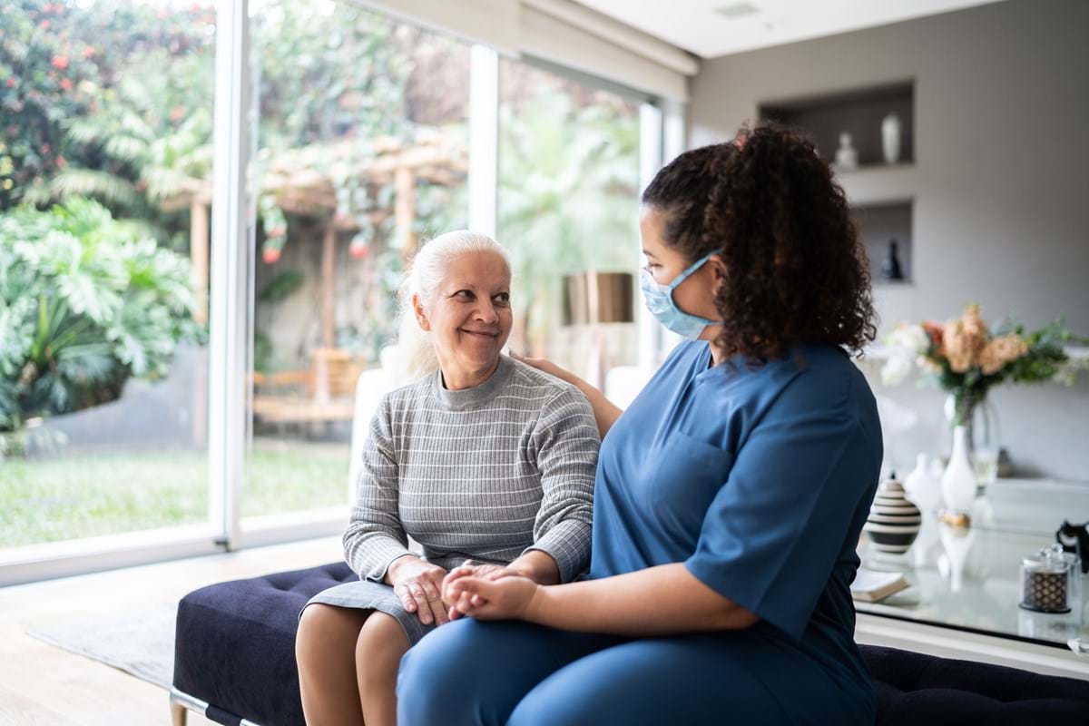 A carer visiting a patient