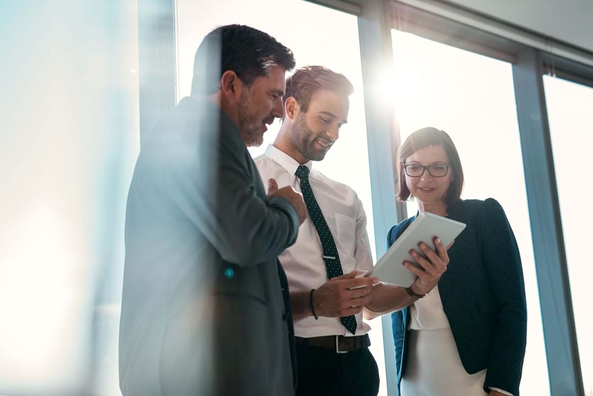 people in an office talking